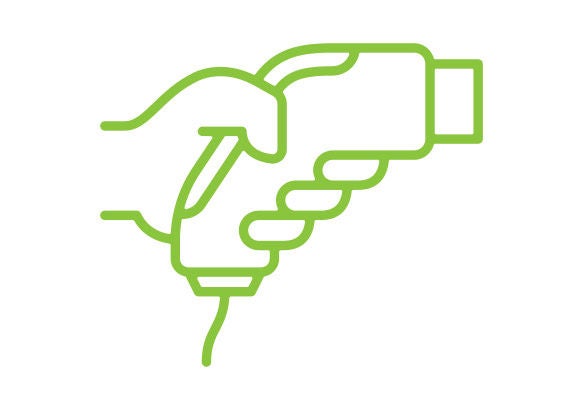 EV Charging 101 Hand holding EV charger connector