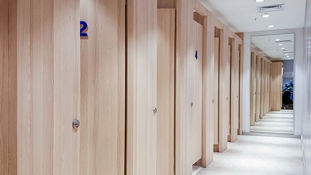 Lighting and lighting controls for fitting rooms