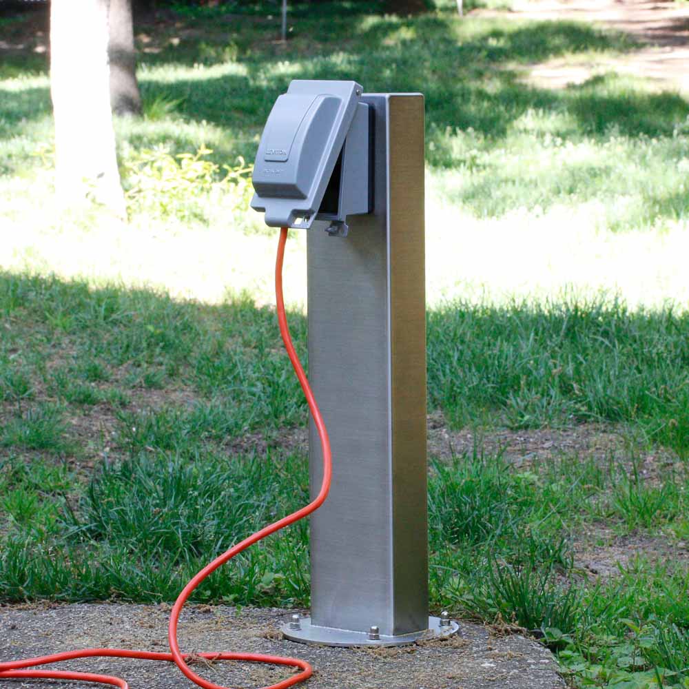 pedestal with weatherproof cover in yard or park