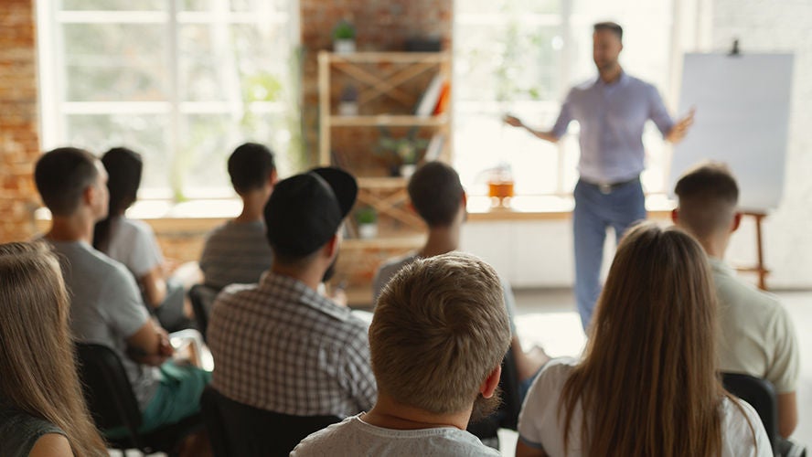 Contractor Trainings Contractor Trainings - Instructor speaking to students
